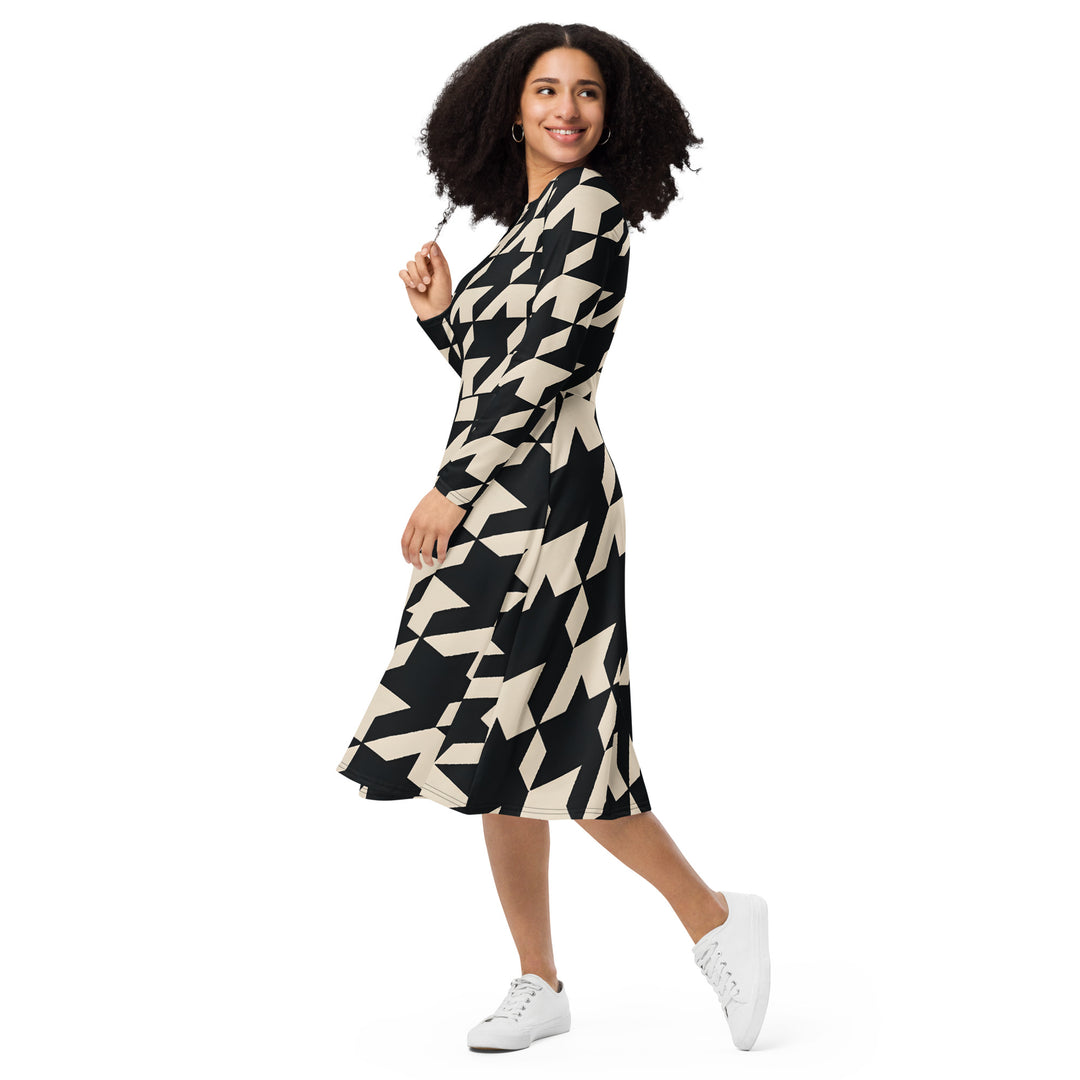 Gutsy Garb black and beige houndstooth midi dress with long sleeves A line silhouette styled with white sneakers