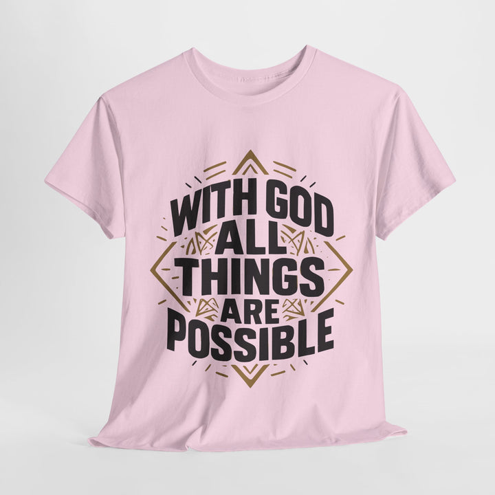 Pink Printify T shirt with bold black and gold typography reading With God All Things Are Possible unisex Christian streetwear